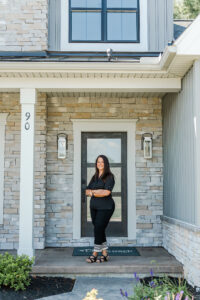 real estate agent branding session in front of a house