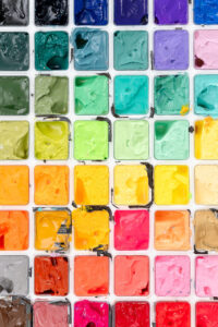 close up image of paint palette with many different colors