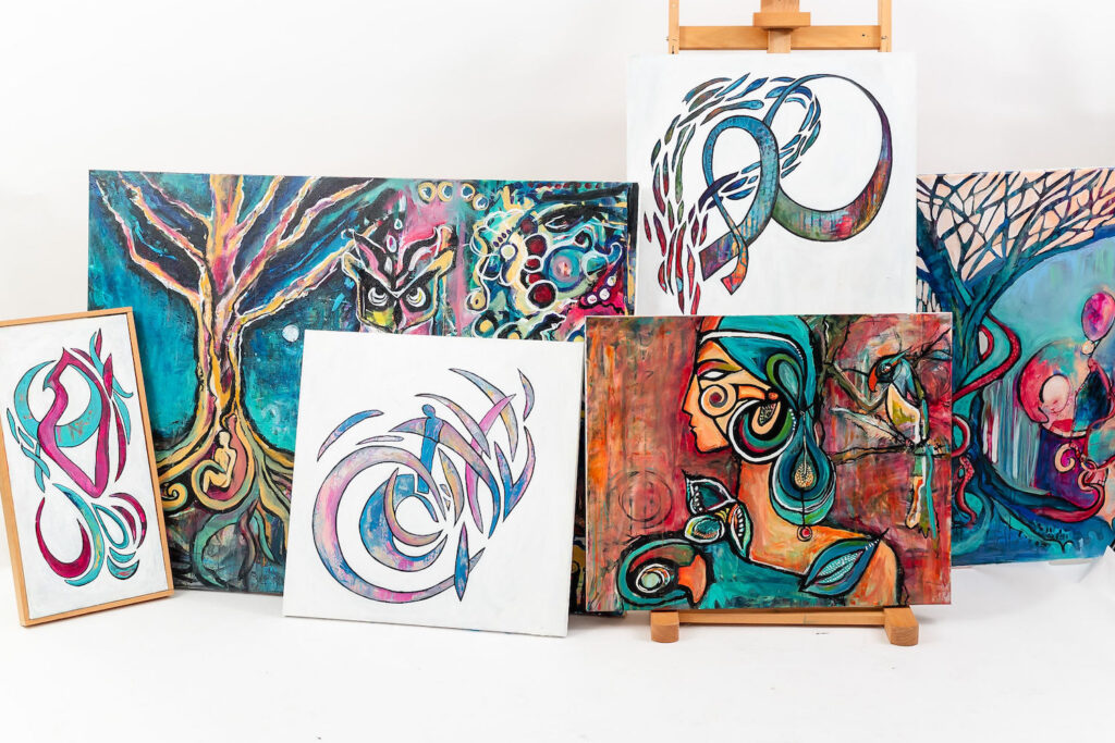 canvases with artwork displayed on them